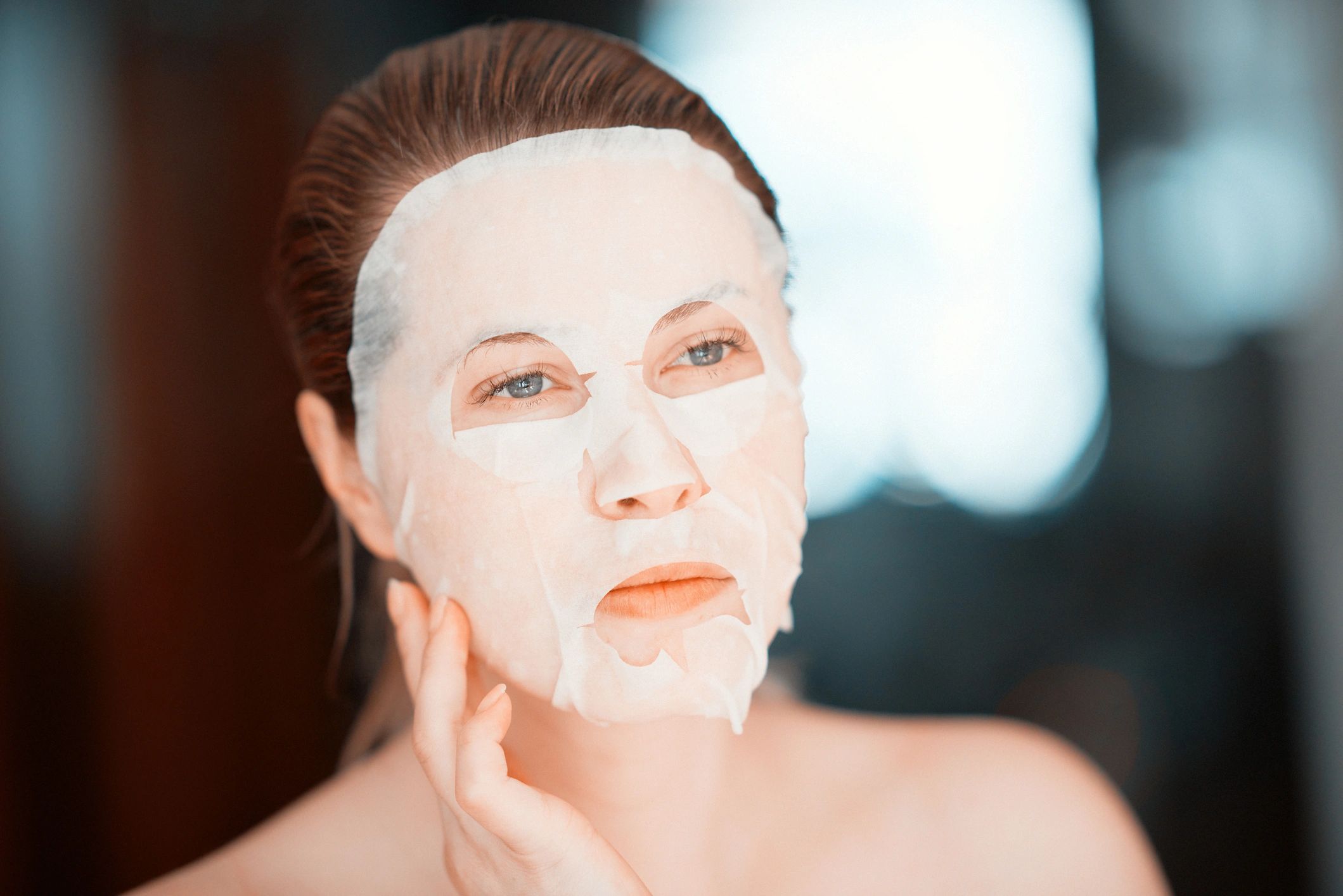 Woman with glowing skin after a professional skincare treatment