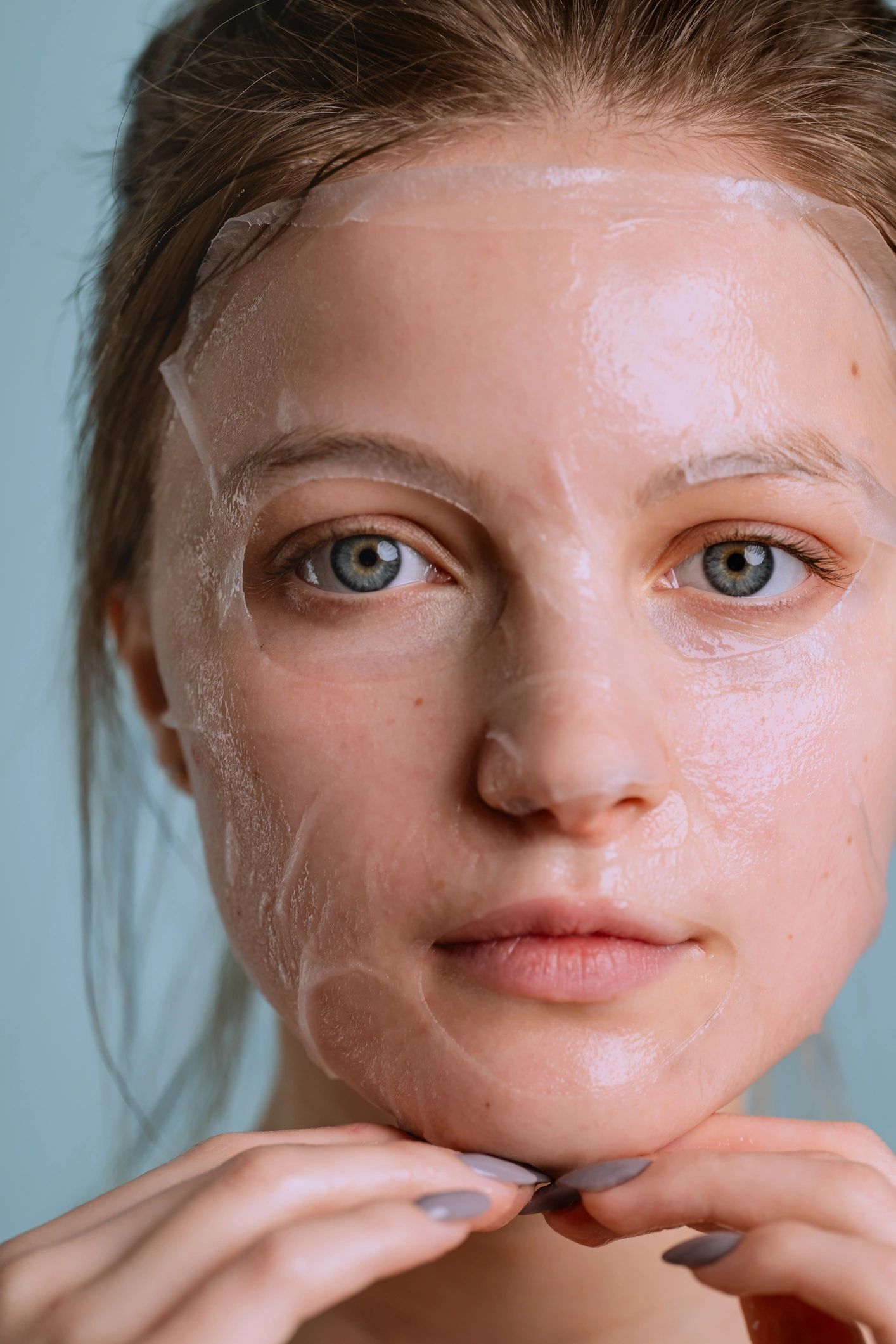Woman with glowing skin after a skincare treatment