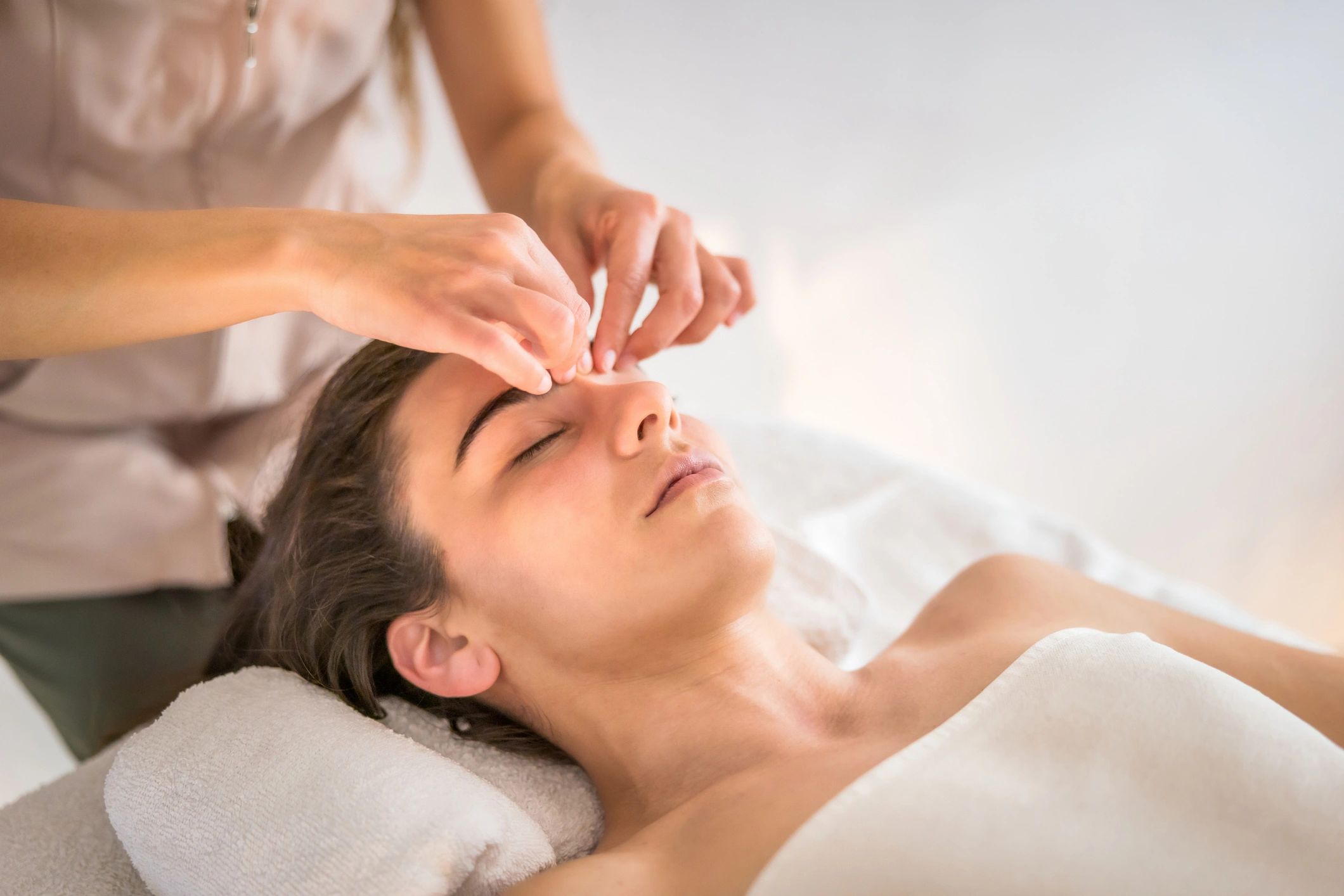 Client receiving a professional facial treatment at Flawless Skin Med Spa